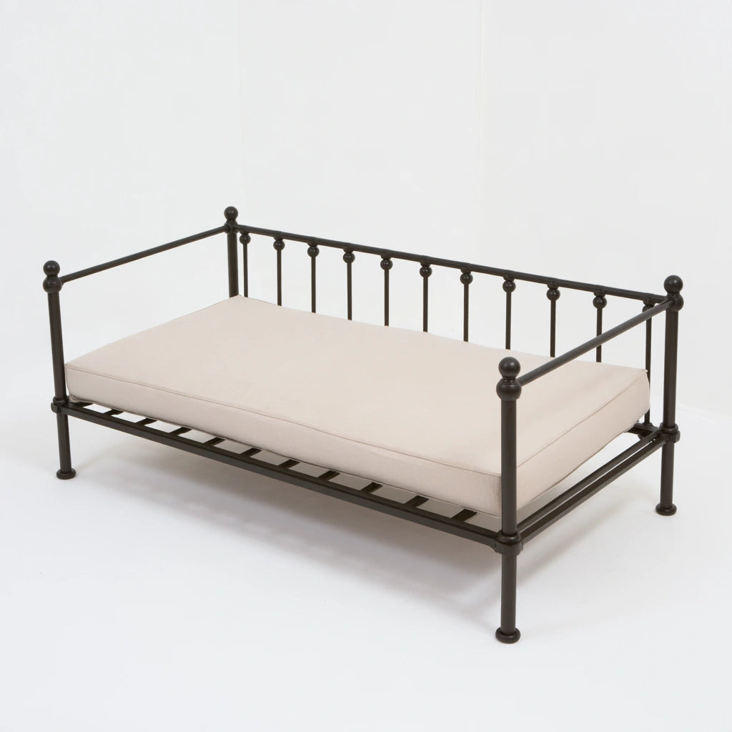 Black metal bedframe in classic style, shown from a high angle, part of MirrorandMist's bedden en bedonderstellen collection.