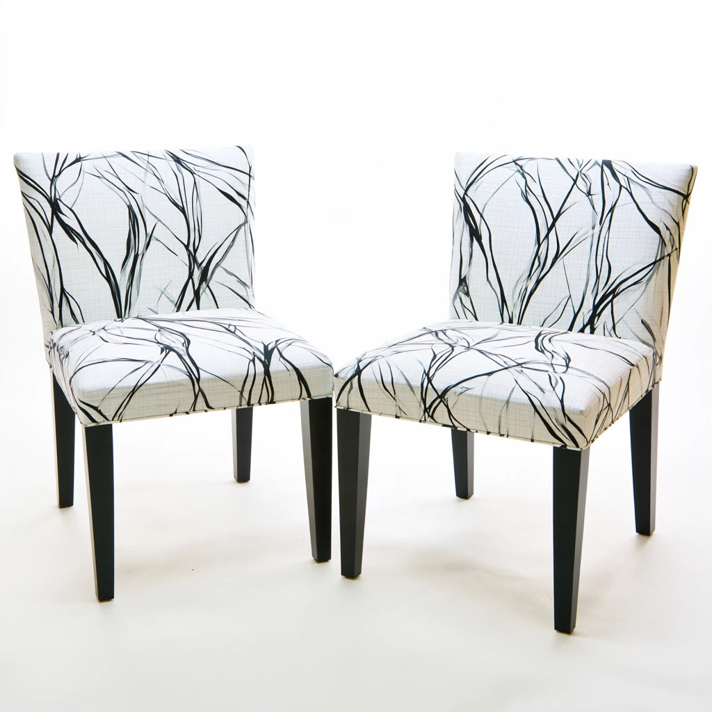 Gray high-back dining chair with abstract patterned upholstery by mirrorandmist, showcasing elegant and modern kitchen seating.