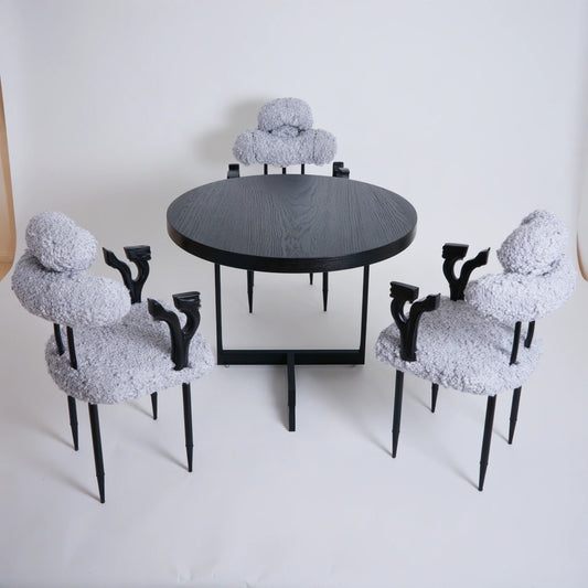 Modern gray dining set with a rectangular table and four matching chairs, designed for contemporary kitchens or dining rooms.