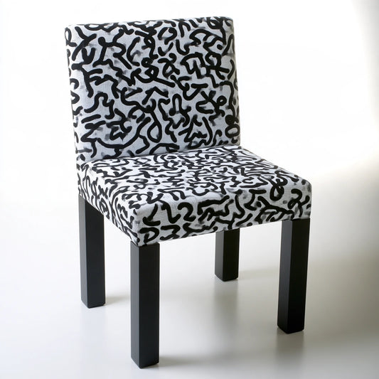 Mirrorandmist gray high-back dining chair with abstract patterned upholstery, showcasing a modern and stylish kitchen or dining room seat.