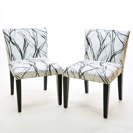 Gray high-back dining chair with abstract patterned upholstery by mirrorandmist, showcasing elegant and modern kitchen seating.